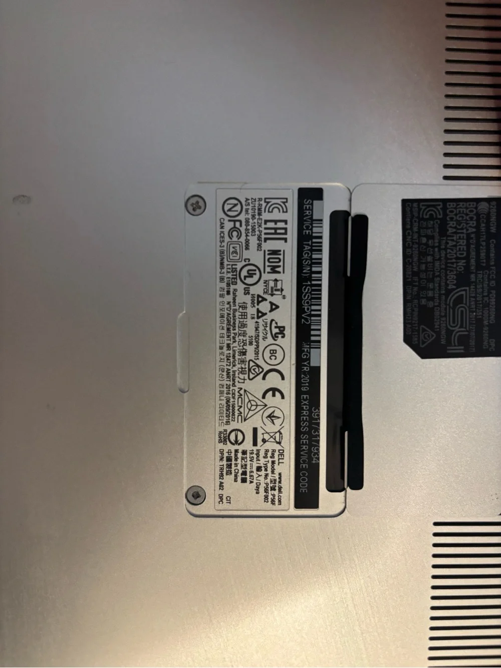 Dell Laptop with Black Chassis and Silver Keyboard Trim